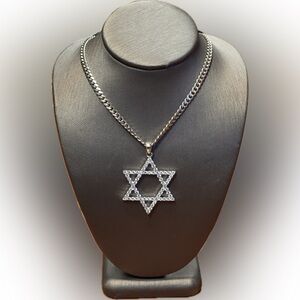 Sterling silver 925 Star of David iced out cz and 22” Cuban link chain.